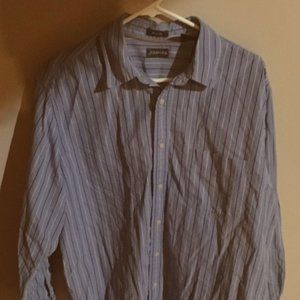 Dressy button up blue shirt with navy and white stripes.